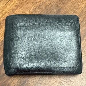Burberry Black Leather Bi-Fold Wallet. In GUC.